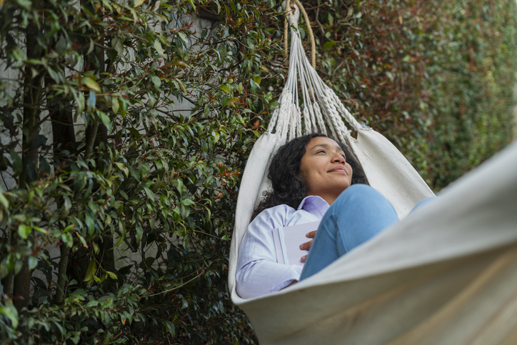 black female relaxing hammock