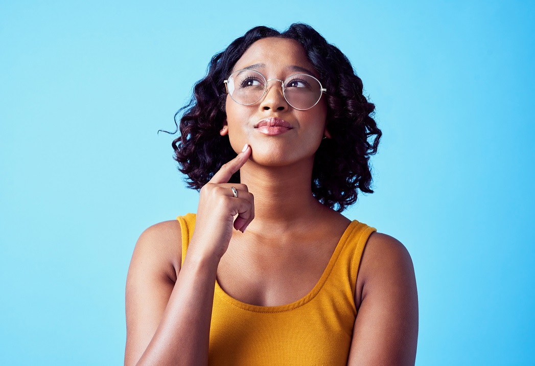 young woman thinking contemplating